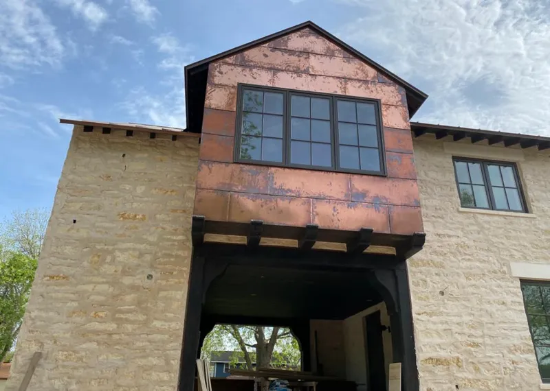 Copper metal panel facade on a stone building for Skylight Installation in Croton-on-Hudson