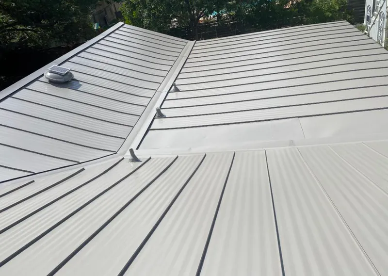Solar attic fan installed on a metal roof for Roof Ventilation in Croton-on-Hudson